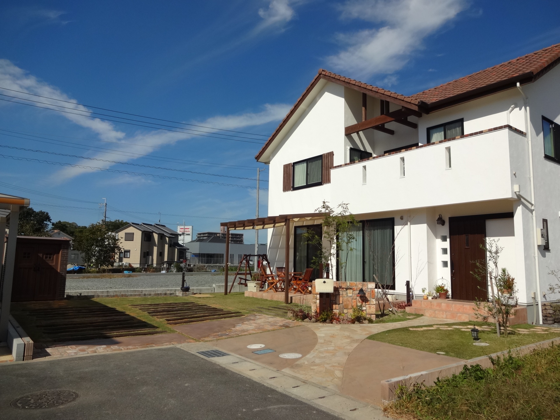 煉瓦と芝生・枕木のナチュラルなお庭　太子町M様邸1